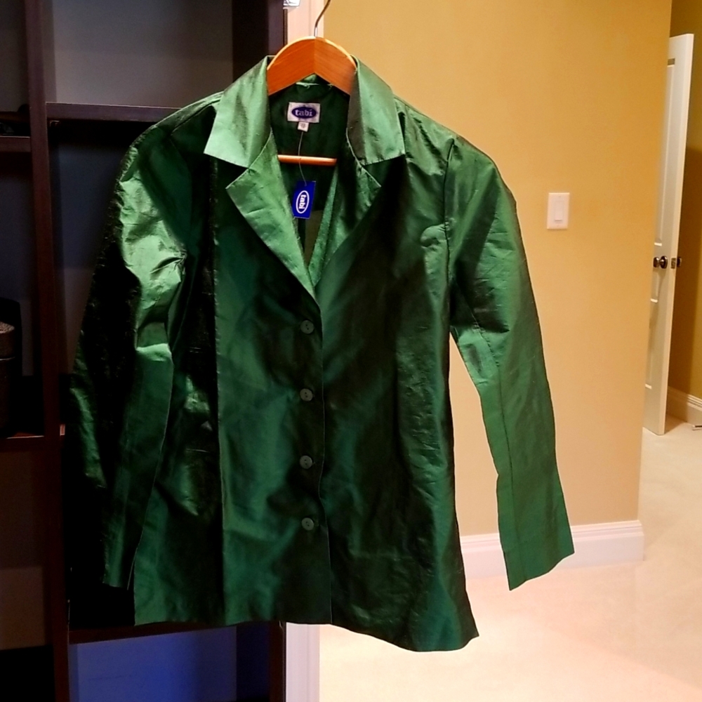- NWT...Beautiful shimmering emerald tabi blouse.Never worn.